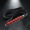 Beaded Whip | Flogger με Λαβή από Χάντρες & Μακριές Ουρές — για εσένα που θέλεις το παιχνίδι σου να έχει χαρακτήρα